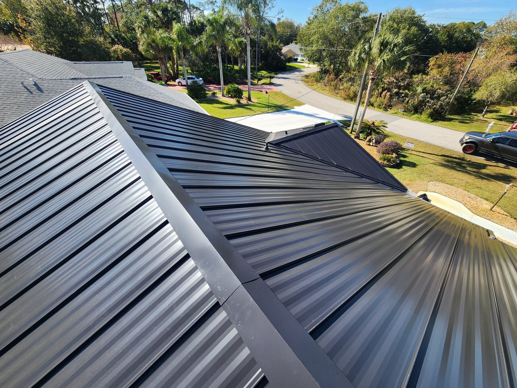 Standing-seam metal roof detail by Ridge Right Roofing