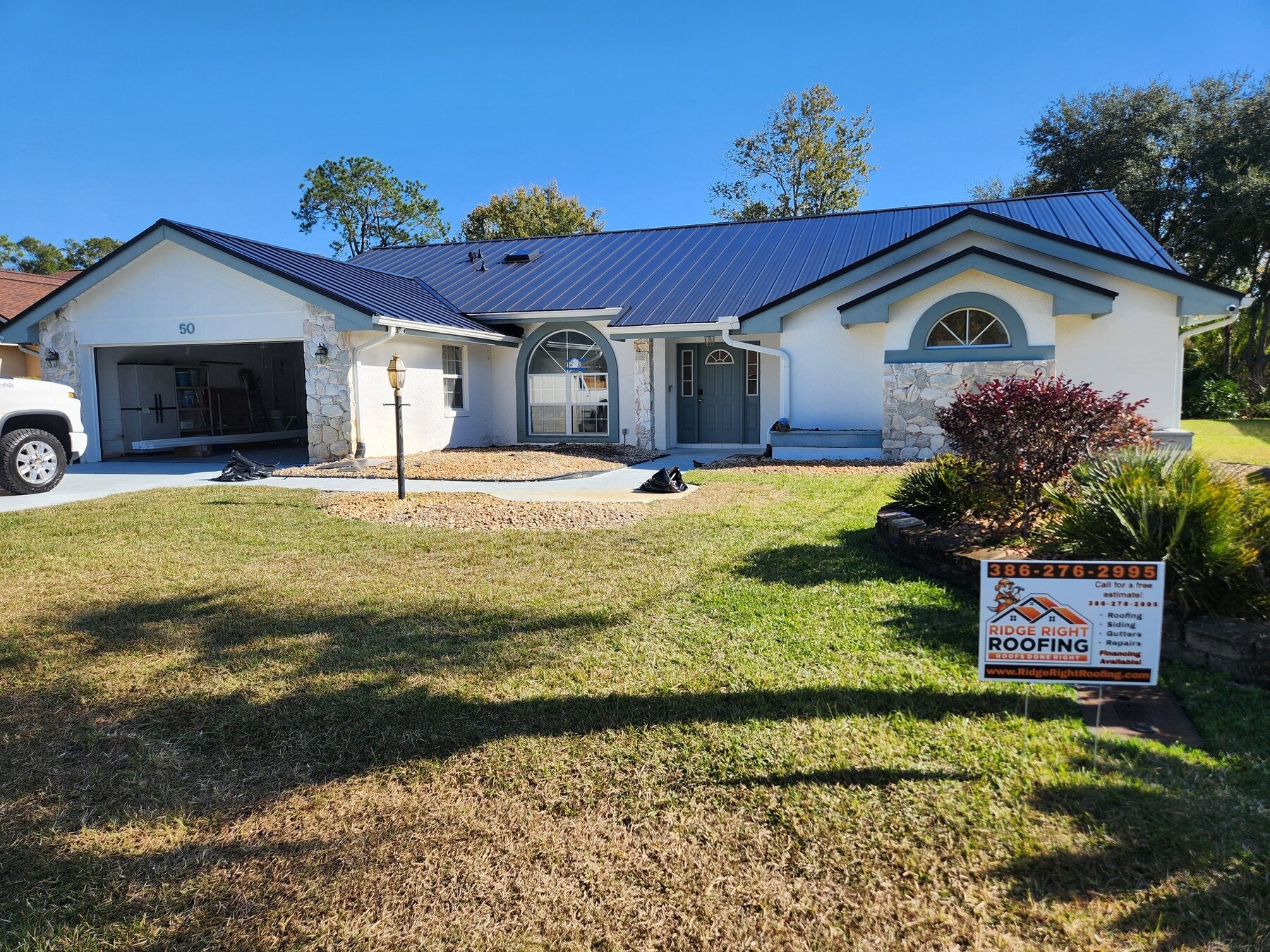 Completed standing-seam metal roof by Ridge Right Roofing