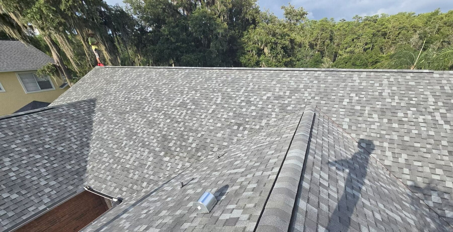 Completed architectural shingle roofing by Ridge Right Roofing