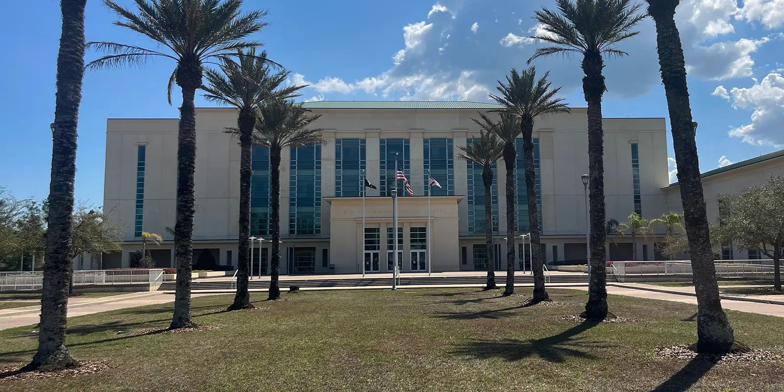Flagler County courthouse framed by palm trees