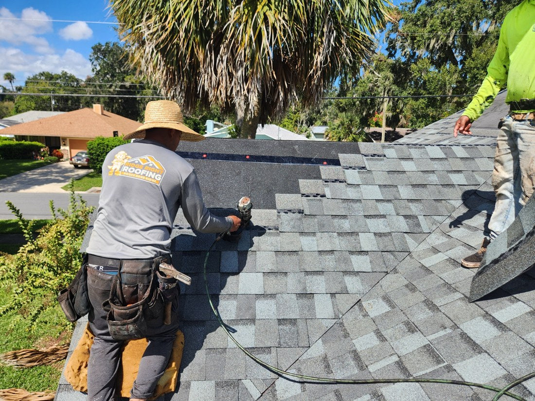 Ridge Right Roofing crew working on roof shingles