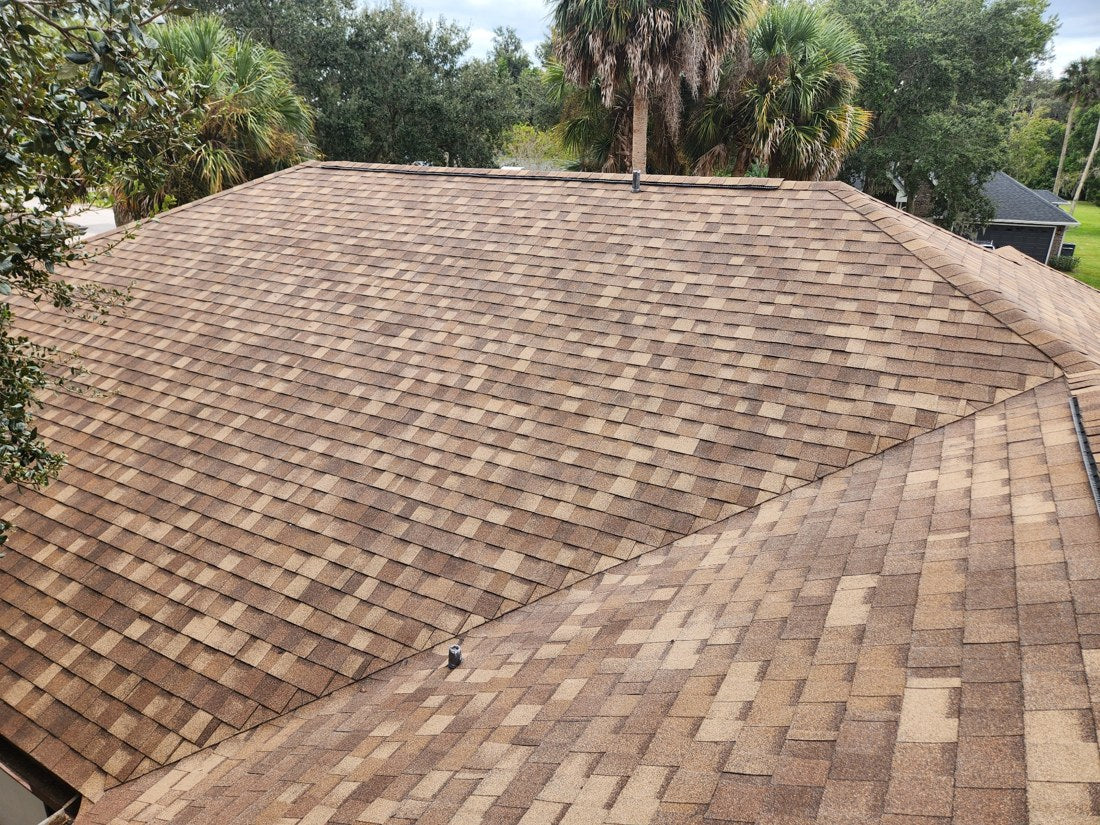 Completed brown architectural shingle roof by Ridge Right Roofing