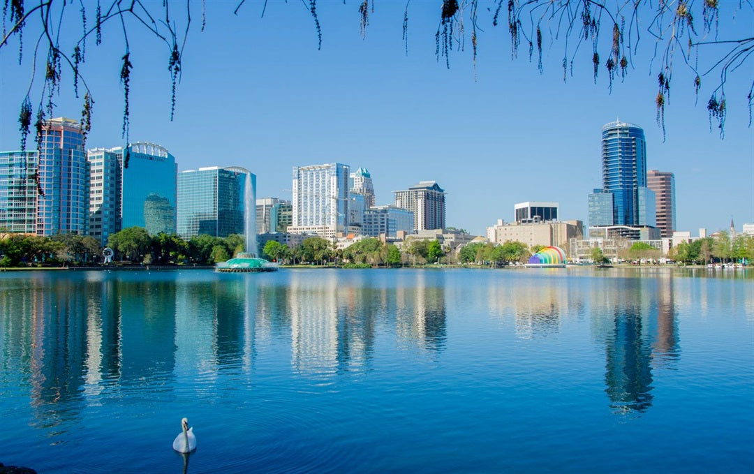Orlando skyline reflected in the lake on a clear day